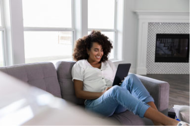 Woman sitting on couch